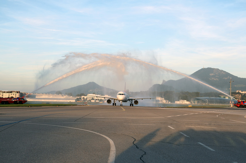 The aircraft was welcomed by a water arch